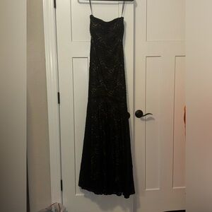 Cashé Black dress with tan floral underneath!